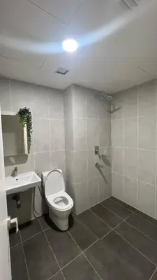 a bathroom with a toilet and a sink at AF Guesthouse Kampung Baru, KL in Kuala Lumpur