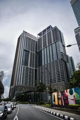a street in front of a large building at The Platinum KLCC By Aura Suites in Kuala Lumpur