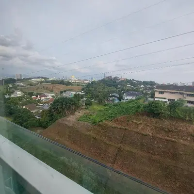 a view of a city from a window at Damas Plaza-Hartamas in Kuala Lumpur