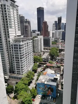 an aerial view of a city with tall buildings at Seri Bukit Ceylon in Kuala Lumpur