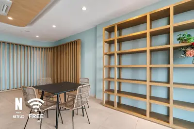 a dining room with a table and chairs at Mont Kiara Ooak Suite Sunway 163 with Bathtub 2 Bed in Kuala Lumpur