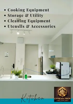 a white kitchen with a sink and a counter at Cityscape Retreat TRION KL Premium Suites in Kuala Lumpur