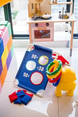 a toy kitchen with a toy bear and a sink at Majestic Residence By Feel Home in Kuala Lumpur