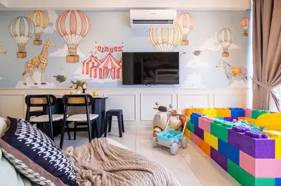 a childs bedroom with a colorful room with a table at Majestic Residence By Feel Home in Kuala Lumpur