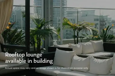 a room with white pillows and plants on a building at Blueground Kuala Lumpur pool nr KL Bird Park KUL-3 in Kuala Lumpur