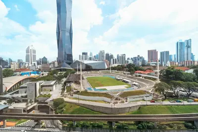 a view of a city with a skyscraper at Blueground Kuala Lumpur pool nr Titiwangsa Park KUL-4 in Kuala Lumpur