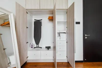 a room with a closet with a skateboard in it at Blueground Kuala Lumpur pool nr Titiwangsa Park KUL-4 in Kuala Lumpur