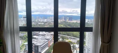 a view of a city from a window at Agile Twilight Residence Apartment in Kuala Lumpur