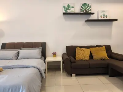 a bed and a couch in a room at 01 Kuala Lumpur KL Mid Valley The Garden 9Seputeh Vivo Soho 2PAX in Kuala Lumpur