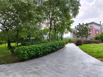a walking path in a park with trees and bushes at 01 Kuala Lumpur KL Mid Valley The Garden 9Seputeh Vivo Soho 2PAX in Kuala Lumpur
