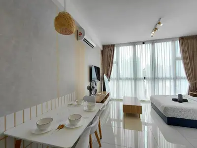 a living room with a table and a bed at KLCC Modern Stay, Majestic Residence, 2-5Pax in Kuala Lumpur