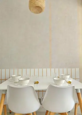 a white table with two white chairs and a table with bowls at KLCC Modern Stay, Majestic Residence, 2-5Pax in Kuala Lumpur