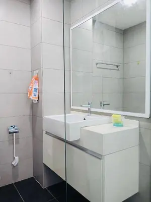 a bathroom with a white sink and a mirror at Setapak Central Mall Zetapark Home Sweet Home 2 in Kuala Lumpur