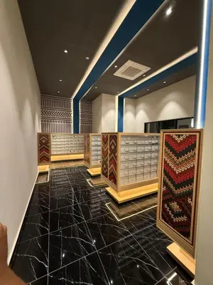a room with a lobby with a rug on the floor at Majestic Residence KL in Kuala Lumpur