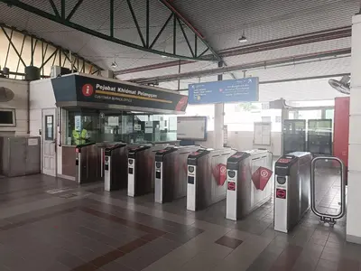 a row of parking meters in a building at Warm & Spacious 2BR Apartment in Kuala Lumpur