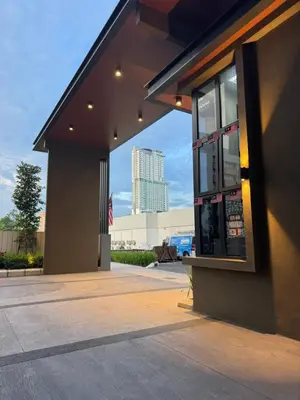 a building with a window on the side of it at Majestic Serviced Suites KLCC in Kuala Lumpur