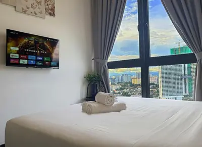 a bedroom with a white bed with a large window at Neu Suites Apartments by LammyNora in Kuala Lumpur