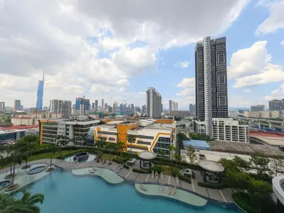 a view of a city with buildings and a pool at TRION The 108 Family Suite Pool & City view in Kuala Lumpur