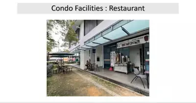 a view of a building with tables and chairs at The Colony By Infinitum P in Kuala Lumpur