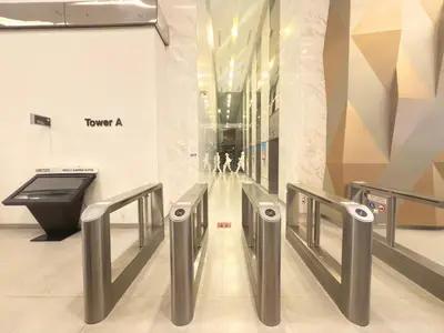 a lobby of a shopping mall with escalators and a sign at Summer popular suites kl Bukit Bintang in Kuala Lumpur