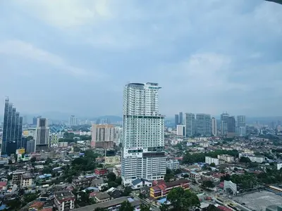 a view of a city with a tall building at Colony Infinitum KualaLumpur by FR in Kuala Lumpur