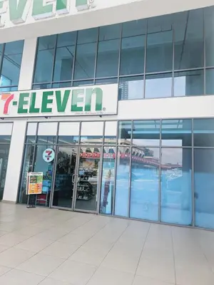 a store with a sign on the front of a building at Colony Infinitum KualaLumpur by FR in Kuala Lumpur
