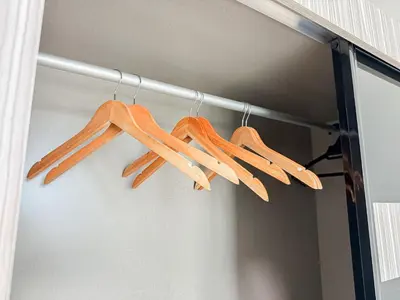four wooden utensils are hanging on a rod at Mountain City View 3BR Condo with Swimming Pool & Free WiFi Netflix in Kuala Lumpur