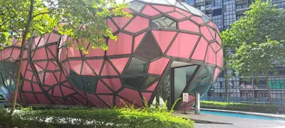 a large red and black object in a city at Arte Plus KLCC Family Studio Apartment Kuala Lumpur in Kuala Lumpur