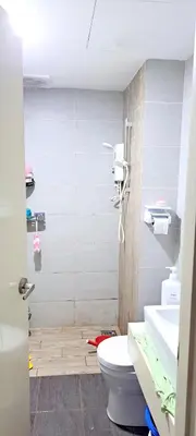 a bathroom with a toilet and a sink at Arte Plus KLCC Family Studio Apartment Kuala Lumpur in Kuala Lumpur