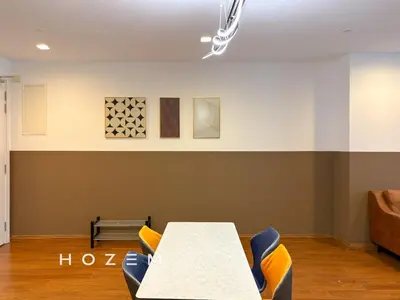 a room with a table and chairs and a couch at 2BR3B Hozem KL1602 Apartment KLCC in Kuala Lumpur
