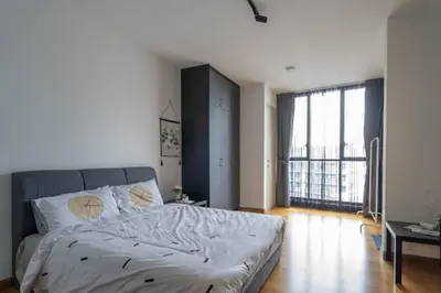 a bedroom with a large bed and a large window at NEW 2BR KL Gateway LRT Midvalley and KLCC, KL Sentral in Kuala Lumpur