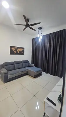 a living room with a couch and a ceiling fan at Astoria Ampang City Centre in Kuala Lumpur
