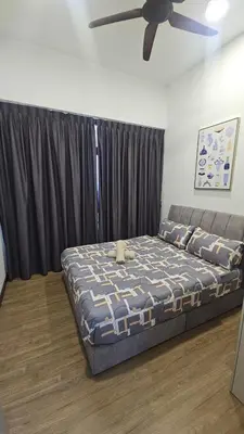 a bedroom with a bed and a ceiling fan at Astoria Ampang City Centre in Kuala Lumpur