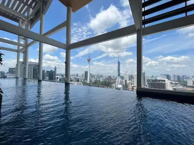 a swimming pool with a view of the city at The Colony By Infinitum F in Kuala Lumpur