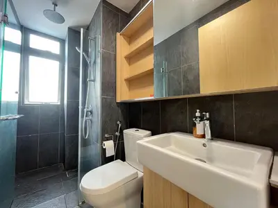 a bathroom with a sink and a toilet and a shower at The Colony By Infinitum N in Kuala Lumpur
