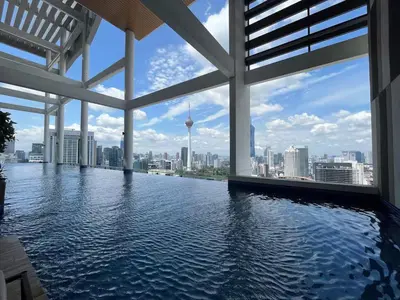 a swimming pool with a view of the city at The Colony By Infinitum K in Kuala Lumpur