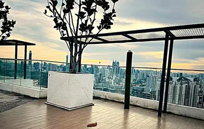 a view of a city skyline from a building at New 5 min Gleneagles Hospital 10 min KLCC in Kuala Lumpur