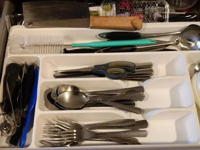 two plastic containers filled with utensils and spoons at Fahrenheit 88 Pavilion TRX 2 BedRoom 2 Bathroom Bukit Bintang in Kuala Lumpur