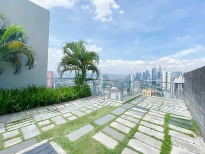 a balcony with a view of a city at Regalia Studio apartment in Kuala Lumpur