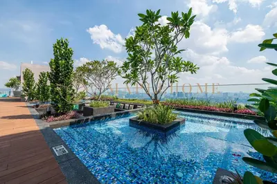 a swimming pool on the roof of a building at Delightful Studio Suite in Kuala Lumpur