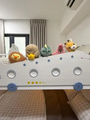 a group of stuffed animals sitting on a bed at Modern KL City M vertica condo near MRT, TRX & Sunway Velocity, infinity pool & Parking in Kuala Lumpur