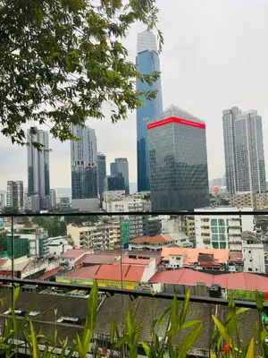 a view of a city skyline with a train at Axon Suite near Pavilion KL by Sky in Kuala Lumpur
