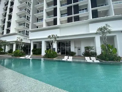 a swimming pool in front of a building at Quill Residence by Infinity pool in Kuala Lumpur