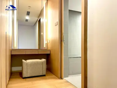 a bathroom with a walk in shower and a mirror at 188 Suites KLCC by VastHaven in Kuala Lumpur