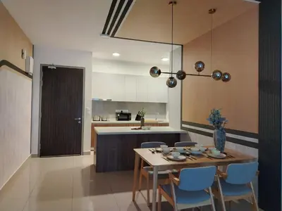a kitchen and dining room with a table and chairs at M Vertica Elegant Stay in Cheras in Kuala Lumpur