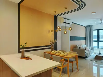 a kitchen and living room with a table and chairs at M Vertica Elegant Stay in Cheras in Kuala Lumpur