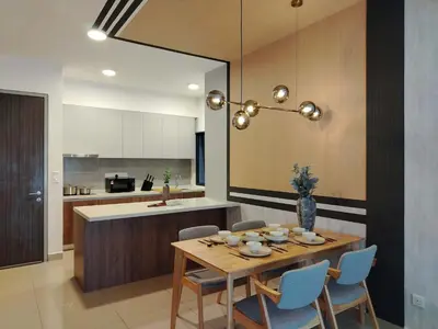 a kitchen and dining room with a table and chairs at M Vertica Elegant Stay in Cheras in Kuala Lumpur