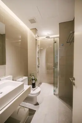 a bathroom with a sink toilet and a shower at Chic Cityscape Homestay in Bukit Bintang 1-5 people in Kuala Lumpur