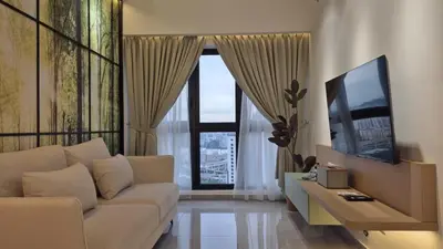 a living room with a couch and a large window at Two Bedrooms Bukit Bintang Agile TRX Pavillion Nature Home Netflix Good View #33 in Kuala Lumpur