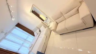 a white bathroom with a window and a shower at majestic Resort Suites KLCC At Bukit bintang in Kuala Lumpur